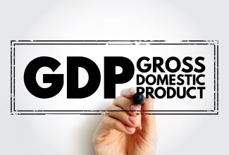 Picture of hand drawing the words Gross Domestic Product (GDP).