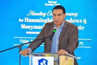 Prime Minister, the Most Hon. Andrew Holness, addresses the handover of keys to beneficiaries of housing units at Hummingbird Meadows and Monymusk Country Estate, held at the Hummingbird Meadows Scheme in Clarendon on (November 10).