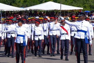 New Jamaica Constabulary Force (JCF) constables perform a march past at the passing out parade held on Wednesday (November 29), at the National Police College of Jamaica in Twickenham Park, St. Catherine.