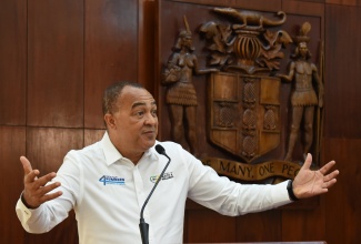  Minister of Health and Wellness, Dr. the Hon. Christopher Tufton, emphasises a point as he addresses a men’s empowerment session organised by the Office of the Prime Minister and the Cabinet Office Gender Committee at Jamaica House on Thursday (November 23).