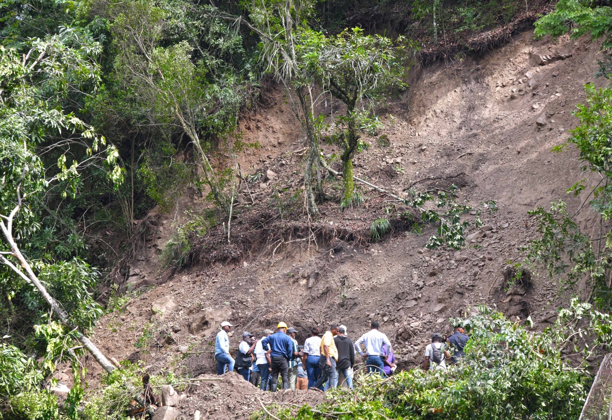 Government officials and stakeholders tour sections of the East Rural St. Andrew constituency on Saturday (Nov. 18), to assess damage due to recent heavy rains. Over 30 landslides were reported in the constituency.