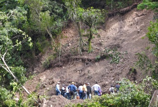 Government officials and stakeholders tour sections of the East Rural St. Andrew constituency on Saturday (Nov. 18), to assess damage due to recent heavy rains. Over 30 landslides were reported in the constituency.

