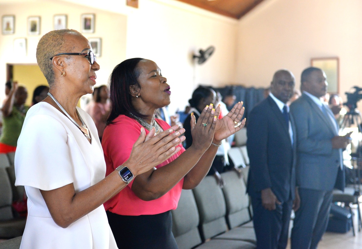 Minister of Education and Youth, Hon. Fayval Williams (left) and Permanent Secretary in the Ministry, Dr. Kasan Troupe, participate in the Anti-Gang Week Church Service held at the Rose Town Holiness Christian Church in Kingston today (November 5).