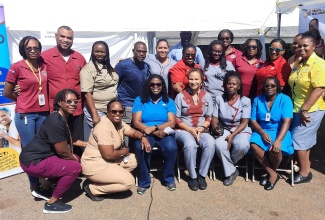 The team of health professionals, including nurse practitioners, non-communicable disease (NCD) coordinator, a dental team, community health aides and medical technologists at the Southern Regional Health Authority (SRHA) Nurse Practitioners Men's Day health fair, held at the community square in Siloah, St. Elizabeth, on November 23.
