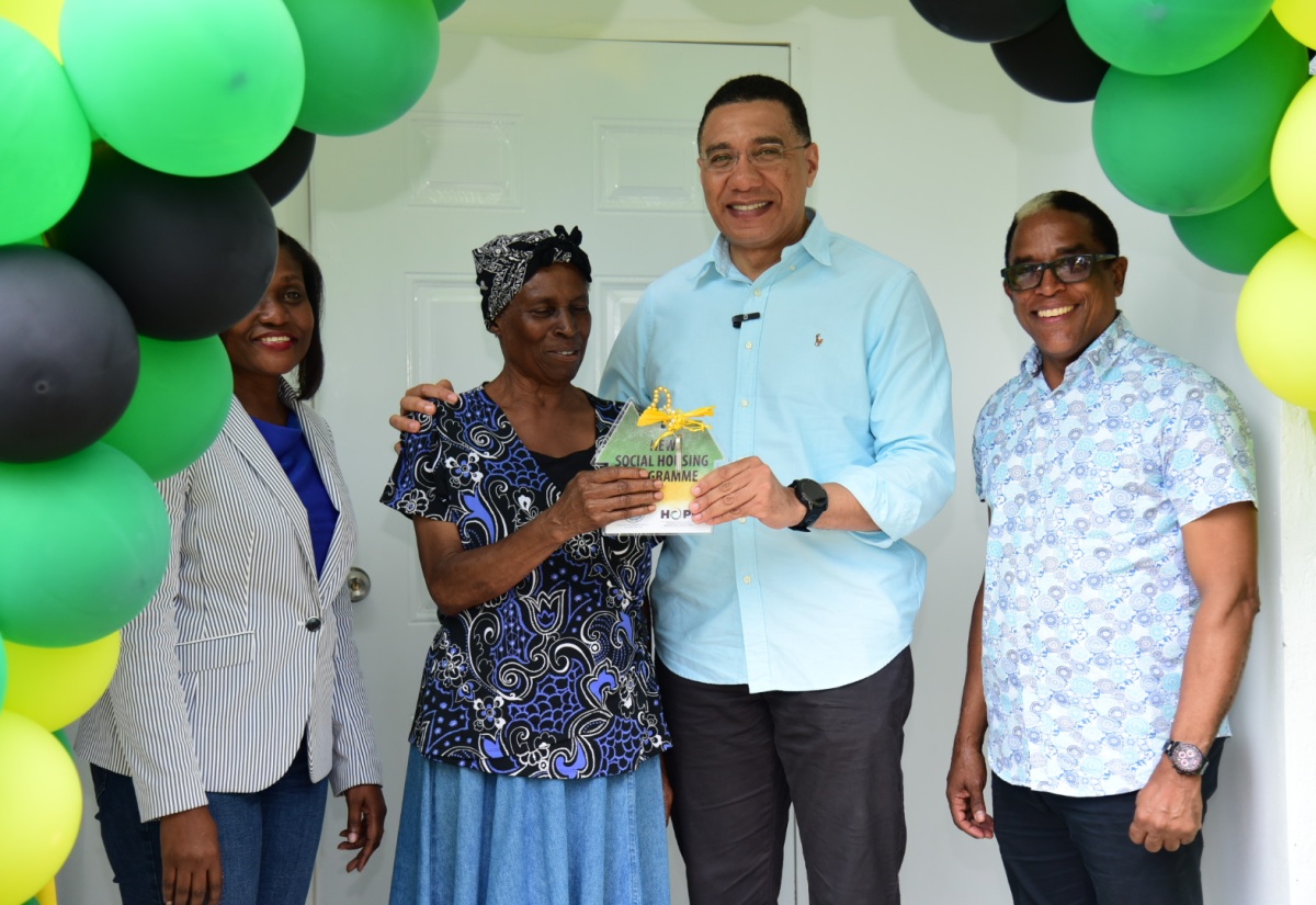 PHOTOS: PM Hands Over One-bedroom Unit in Belfield, St. Mary