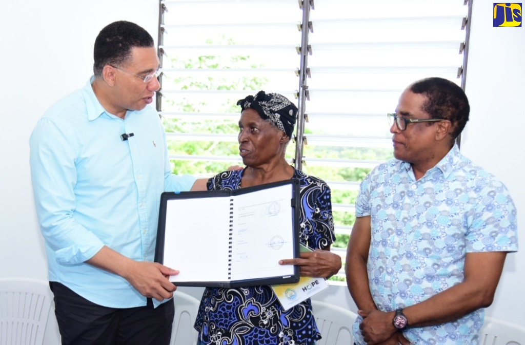 PHOTOS PM Hands Over Onebedroom Unit in Belfield, St. Mary Jamaica