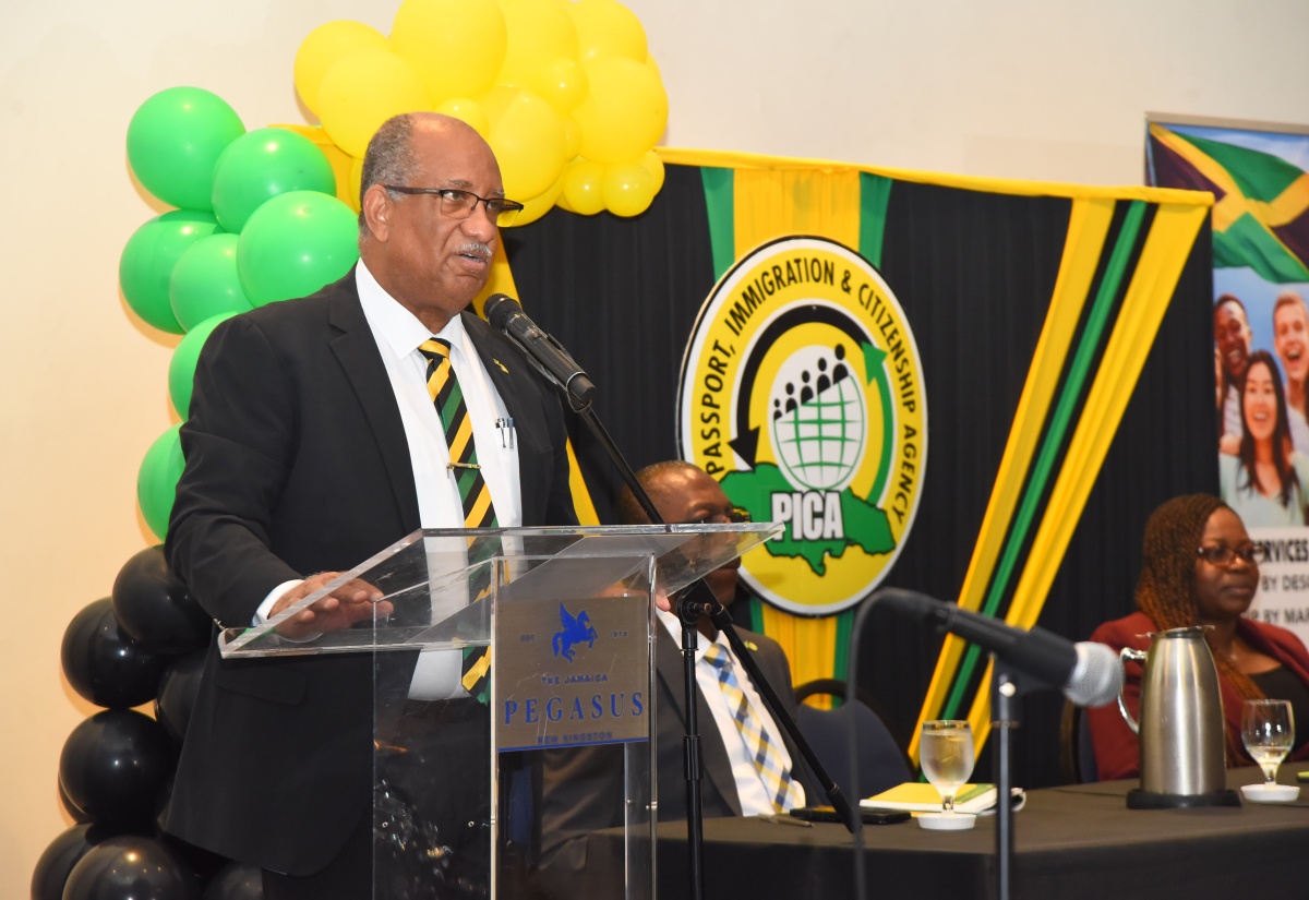 Chief Executive Officer, Passport, Immigration and Citizenship Agency (PICA), Andrew Wynter, delivers remarks during Monday’s (December 4) citizenship ceremony at The Jamaica Pegasus hotel in New Kingston.
