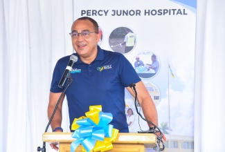 Minister of Health and Wellness, Dr. the Hon. Christopher Tufton, speaks during Thursday’s (December 7) launch of the Compassionate Care Programme at the Percy Junor Hospital in Manchester.