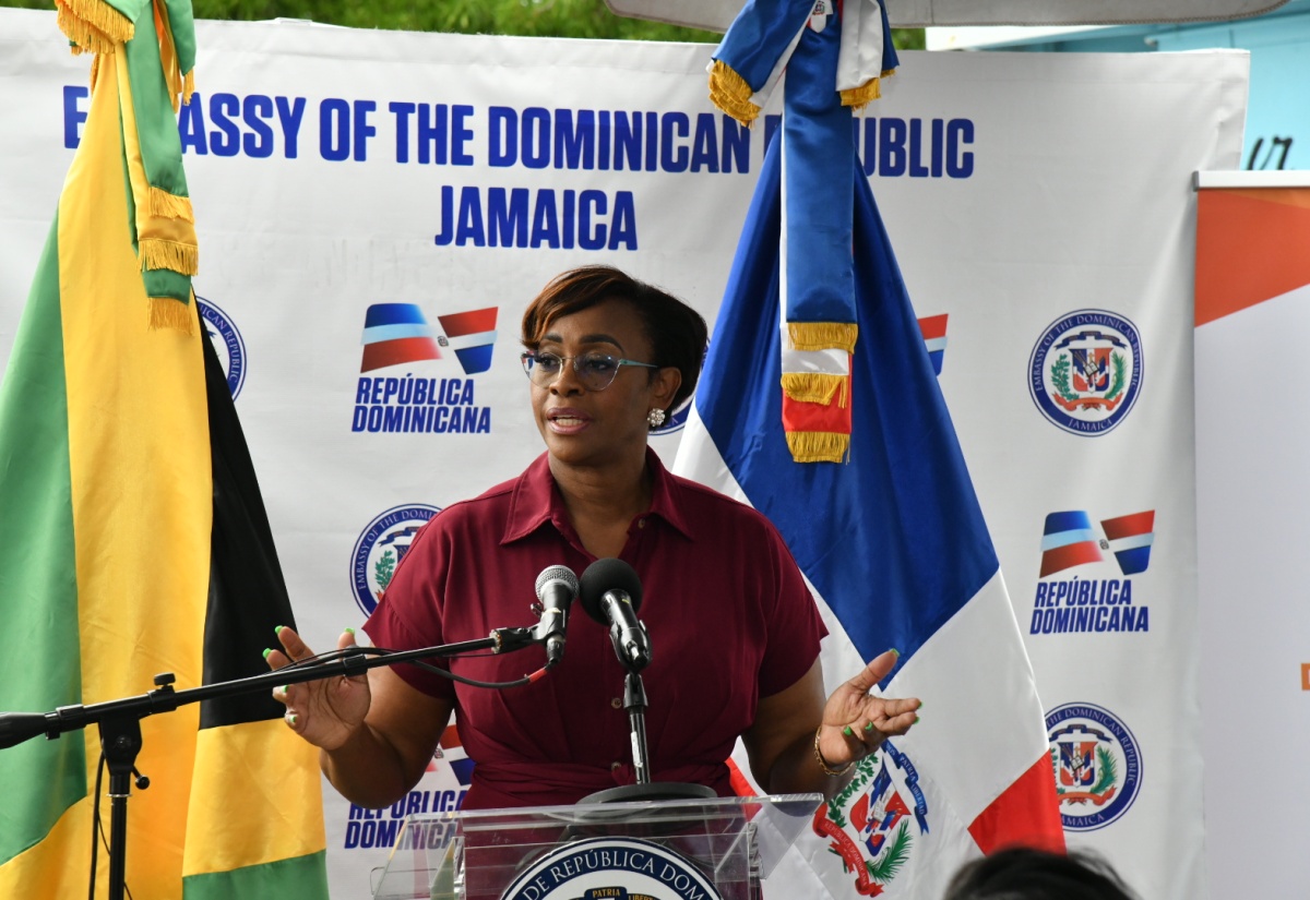 Speaker of the House of Representatives, the Most Hon. Juliet Holness, shares words of encouragement with students at the Clan Carthy Primary School in Kingston on Tuesday (November 28). Occasion was a ceremony for the handover of a computer room at the institution, which was renovated and equipped under the Embassy of the Dominican Republic’s ‘Adopt a School’ programme.

