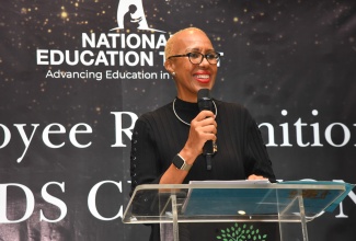Minister of Education and Youth, Hon. Fayval Williams, delivers the keynote address during the National Education Trust (NET) Employee Recognition and Awards Ceremony, held on December 19 at The Jamaica Pegasus hotel in New Kingston.