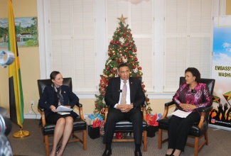 Prime Minister, the Most Hon. Andrew Holness,  addresses members of the diaspora at last night’s (December 6) monthly series, ‘Let’s Connect with Ambassador Marks’, at the Embassy of Jamaica in Washington DC. Also sharing the stage are (from left) Foreign Affairs and Foreign Trade Minister, Senator the Hon. Kamina Johnson Smith and Jamaica’s Ambassador to the United States, Her Excellency Audrey Marks.

