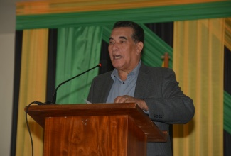Minister of State in the Office of the Prime Minister (West), Hon. Homer Davis, addresses the second staging of the Sam Sharpe Flames of Freedom Lecture at the Montego Bay Cultural Centre in Montego Bay, St. James, on December 14.

