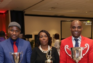 LASCO/Ministry of Education and Youth/Jamaica Teaching Council 2023 TVET Teacher of the Year, Ilene Cohall-Bailey (centre), is flanked by Principal of the Year, Rayon Simpson (left), and Teacher of the Year, Franklin Burrell, during Tuesday's (December 5) awards ceremony at The Jamaica Pegasus hotel in New Kingston. Each awardee received a $100,000 cash prize, plaques and gift baskets courtesy of LASCO. They will also have the unique opportunity of attending the 2024 Association for Supervision and Curriculum Development (ASCD) Conference in Washington DC, from March 22-25, which will aid in enriching their professional development. 

