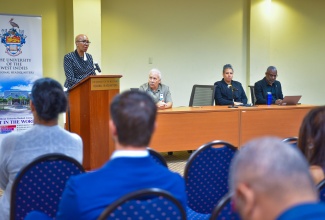 Minister of Education and Youth, Hon. Fayval Willams, delivers remarks at the State University of New York (SUNY) and University of the West Indies (UWI) Health Research Consortium Conference, held at the UWI Regional Headquarters in St. Andrew on Thursday (December 7).