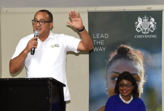 Minister of Health and Wellness, Dr. the Hon. Christopher Tufton, addressing the media launch of the Mindfulness JA Adolescent Mental Health Conference at the Liguanea Club, New Kingston, on December 4.  Listening (at right) is Chief Project Lead, Mindfulness Jamaica,  and Chevening Alumni, Najuequa Barnes. The conference aims to provide mental health sensitisation and training to parents and children, to empower them to identify and address mental health challenges.