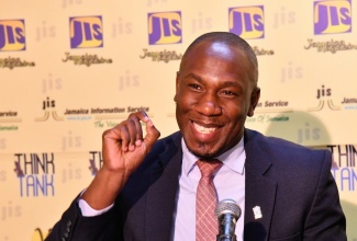 Assistant General Manager for Corporate Communications and Public Affairs at the National Housing Trust (NHT), Dwayne Berbick, addresses a recent Jamaica Information Service (JIS) Think Tank.