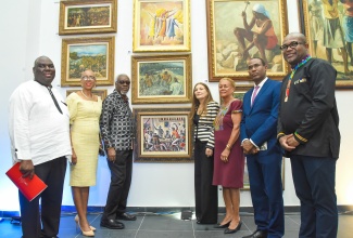 Minister of Education and Youth, Hon. Fayval Williams (second left), and Minister of Finance and the Public Service, Dr. the Hon. Nigel Clarke (second right) pause for a photo opportunity during the handover of the Michael Campbell Art Collection to the University of the West Indies (UWI), Mona, on January 11. Also pictured (from left) are Campus Registrar at the institution, Dr. Donovan Stanberry; Statesman in Residence, UWI, and former Prime Minister, the Most Hon. Percival James Patterson; Donor, Dulcie Moody; Trustee, Margaret Bernal; and UWI Principal, Professor Densil Williams. The late Michael Campbell was a businessman, philanthropist, and art collector.

