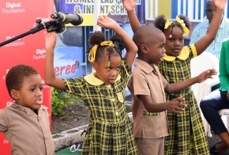 Students at the St. Catherine-based Homestead Primary and Infant School perform during the recent handover of a smart room at the institution, sponsored by the Digicel Foundation.