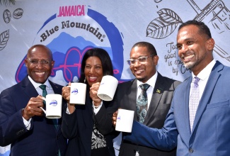Mugs are raised for the launch of the seventh staging of the Jamaica Blue Mountain Coffee Festival, slated for Saturday, March 2. Celebrating (from left) are Minister of Industry, Investment and Commerce, Senator the Hon. Aubyn Hill; Chair of the Gastronomy Network, Nicola Madden-Greig; Minister of Agriculture, Fisheries and Mining, Hon. Floyd Green, and Executive Director, Tourism Enhancement Fund (TEF), Dr. Carey Wallace. The launch was held at Devon House in Kingston on Tuesday (January 9).

