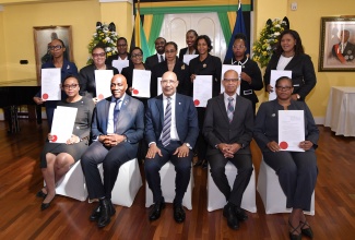 Governor-General, His Excellency the Most Hon. Sir Patrick Allen (seated, centre); Chief Justice, Hon. Bryan Sykes (seated, second left), and President of the Court of Appeal, Hon. Justice Patrick Brooks (seated, second right), with members of the judiciary who were appointed to higher office at today’s (January 8) swearing-in ceremony, held at King’s House.