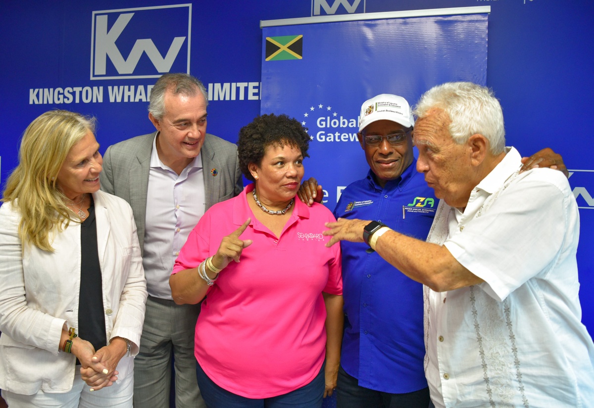 Minister of Industry, Investment and Commerce, Senator the Hon. Aubyn Hill (second right), shares in discussion with (from left) Head of the European Union (EU) Delegation to Jamaica, Ambassador Marianne Van Steen; Director with the EU, Felix Fernandez Shaw; President of the Shipping Association of Jamaica (SAJ), Corah Ann Sylvester; and Chairman of Jamaica Producers Group, Charles Johnson. Occasion was a press briefing held at the Kingston Wharves Limited Corporate Office on Friday (January 26)