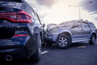 Vehicular crash on a road. 