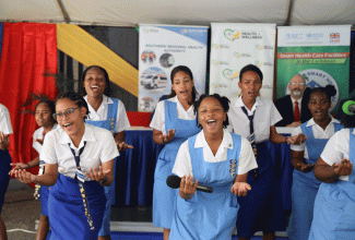 Hampton High School students showcase their musical talent during the handover ceremony for the upgraded Santa Cruz health facility in St. Elizabeth, on January 18.  

