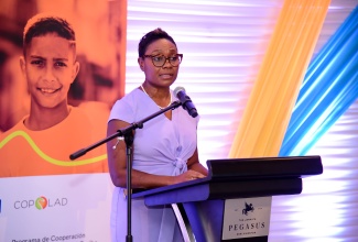 Minister of State in the Ministry of National Security, Hon. Juliet Cuthbert-Flynn, addresses Friday’s (February 2) launch of the Early Warning System (EWS) on Drugs, held at The Jamaica Pegasus hotel in New Kingston.


