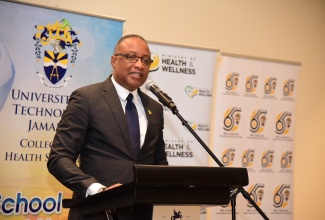 Permanent Secretary in the Ministry of Health and Wellness, Dunstan Bryan, delivers the keynote address during Friday’s (February 23) graduation ceremony for 39 public health officers who received professional certification in Healthcare Administration and Leadership from the University of Technology (UTech). The ceremony was held at the Jamaica Pegasus Hotel in New Kingston