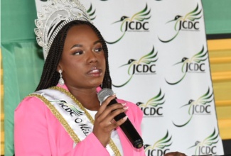 Miss Jamaica Festival Queen 2023, Aundrene Cameron, addresses the audience at the recent launch of her official Festival Queen Project, titled, ‘Girls Who Fight Back’,  at the Ranny Williams Entertainment Centre in Kingston. 