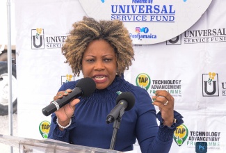 Minister without Portfolio in the Office of the Prime Minister with oversight for Skills and Digital Transformation, Senator Dr. the Hon. Dana Morris Dixon, delivers the keynote address during the launch of a free wi-fi hotspot in Waterford, St. Catherine, on Thursday (February 22).