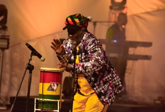 Percussionist, drummer and singer, Bongo Herman performs during the musical tribute to celebrate the 79th anniversary of the birth of late Reggae icon, Bob Marley, held at Emancipation Park, St. Andrew, on February 6.