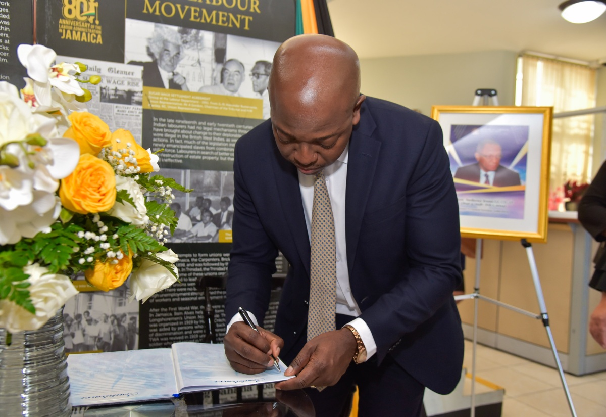 PHOTOS: Minister Charles Jr. Signs Condolence Book for Late Former Permanent Secretary, Anthony Irons