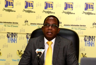 Director of Elections, Glasspole Brown.

