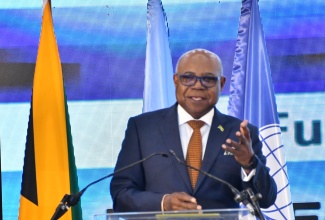 Minister of Tourism, Hon. Edmund Bartlett, addresses the second day of the Global Tourism Resilience Day Conference at the Montego Bay Convention Centre in St. James, on Saturday (February 17). 