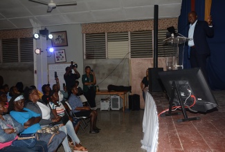 Minister of Labour and Social Security, Hon. Pearnel Charles Jr., addresses the first in a series of PATH town hall meetings, at the Wesley Methodist Church Hall in Brown’s Town, St. Ann, on Wednesday, January 31.

