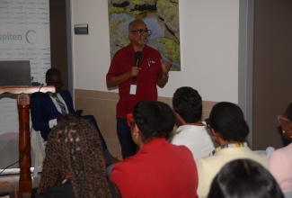 Clinical Coordinator for the Western Regional Health Authority (WRHA), Dr Delroy Fray, addresses a meeting of the Montego Bay Chamber of Commerce and Industry (MBCCI) in Rose Hall, St. James, on February 22.