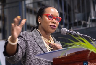 Permanent Secretary in the Ministry of Education and Youth, Dr. Kasan Troupe, addresses the ‘Rapping with the Minister’ forum on Tuesday (February 20) at Jamaica College in St. Andrew.

