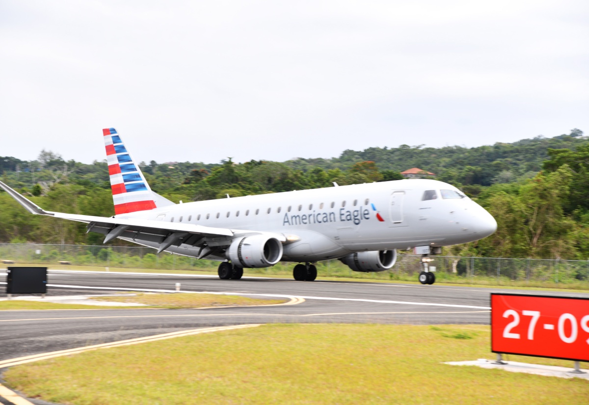 The American Eagle aircraft taxies on the runway after landing at the Ian Fleming International Airport in Boscobel, St. Mary, on Saturday (February 24). The inaugural American Airlines flight from Miami had 71 passengers on board.