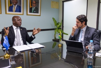 Minister of Labour and Social Security, Hon. Pearnel Charles Jr. (left), engages in conversation with Human Development Programme Leader for Latin America and the Caribbean at the World Bank Group, Emre Özaltın, during a recent courtesy call at the Ministry’s North Street offices in Kingston. The discussions focused on the Social Protection for Increased Resilience and Opportunity (SPIRO) Project, which aims to strengthen social support to Jamaicans.

