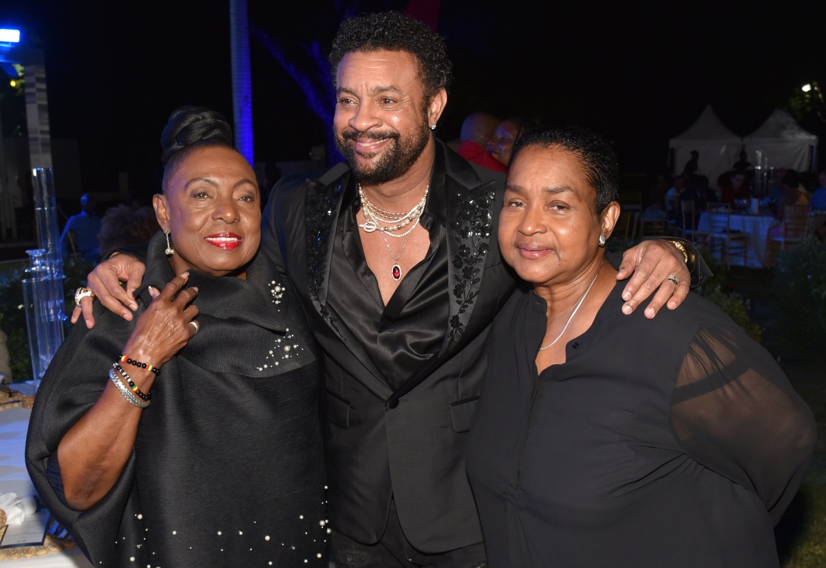 Minister of Culture, Gender, Entertainment and Sport, Hon. Olivia Grange (left), shares a moment with international reggae artiste Orville “Shaggy” Burrell and President of Solid Agency Limited, Sharon Burke, at a dinner at Devon House, St. Andrew, on February 21. The event was held as part of the five-day Island Music Conference, which concluded on February 25 and featured discussions with global music executives and practitioners. 

