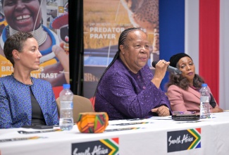 South Africa’s Minister of International Relations and Cooperation, Dr. Grace Naledi Mandisa Pandor (centre), fields questions during a lecture yesterday (March 21), at the University of the West Indies. Also pictured are Minister of Foreign Affairs and Foreign Trade, Senator the Hon. Kamina Johnson Smith (left), and High Commissioner of the Republic of South Africa to Jamaica, Her Excellency Lunka Yenge.

