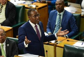 Minister of Finance and the Public Service, Dr. the Hon. Nigel Clarke, delivers his opening presentation of the 2024/25 Budget Debate in the House of Representatives, recently.

