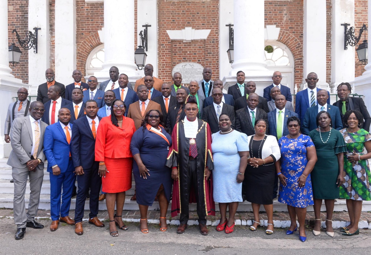 Chairman of the St. Catherine Municipal Corporation and Mayor of Spanish Town, Councillor Norman Scott (first row, centre), along with other Councillors at the St. Catherine Municipal Corporation, share a photo opportunity following the swearing-in ceremony held at Emancipation Square in Spanish Town on Thursday (March 7).