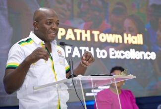 Minister of Labour and Social Security, Hon. Pearnel Charles Jr., addresses the Ministry’s semi-virtual townhall – ‘On a PATH to Transformation with the Ministry of Labour and Social Security’ – on March 13 at the St. Gabriel’s Anglican Church Hall in May Pen, Clarendon.

