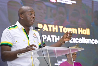 Minister of Labour and Social Security,  Hon. Pearnel Charles Jr., speaks at the Ministry’s townhall series, ‘On a PATH to Transformation with the Ministry of Labour and Social Security’, on March 13, at the Saint Gabriel’s Anglican Church Hall in May Pen, Clarendon, and online.

