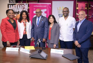 Minister of Tourism, Hon. Edmund Bartlett (third left), with (from left) Permanent Secretary, Ministry of Tourism, Jennifer Griffith; President, Caribbean Hotel & Tourism Association (CHTA), Nicola Madden-Greig; Executive Director, Jamaica Hotel and Tourist Association (JHTA), Camille Needham; Director of Tourism, Donovan White and President, JHTA, Robin Russell, following the CHTA Caribbean Travel Marketplace press briefing at the Jamaica Tourist Board office in Kingston, on March 14.

