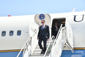 United States Secretary of State, Antony Blinken, disembarks the Secretary’s Plane at the Norman Manley International Airport (NMIA) in Kingston on Monday (March 11). Secretary Blinken is visiting Jamaica for a high-level meeting on Haiti, being held under the aegis of the Conference of Heads of Government of the Caribbean Community (CARICOM), at The Jamaica Pegasus hotel in New Kingston.