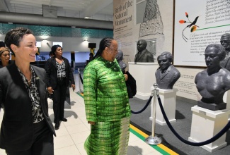 Minister of Foreign Affairs and Foreign Trade, Senator the Hon. Kamina Johnson Smith (left), accompanies South Africa’s Minister of International Relations and Cooperation, Her Excellency Dr. Naledi Pandor, as she looks at busts of Jamaica’s National Heroes, at the Norman Manley International Airport (NMIA) in Kingston, shortly after her arrival in the island on Wednesday night (March 20). The official visit is in commemoration of 30 years of diplomatic relations between the countries this year. While in Jamaica, Dr. Pandor will have the opportunity to call on Prime Minister, the Most Hon. Andrew Holness, and will co-chair with Minister Johnson Smith a hybrid CARICOM-South Africa Ministerial Meeting. The two Ministers will also engage in bilateral discussions spanning critical areas and a review of new areas for cooperation in education, healthcare innovation, technological advancement and agricultural development for both Jamaica and South Africa.

