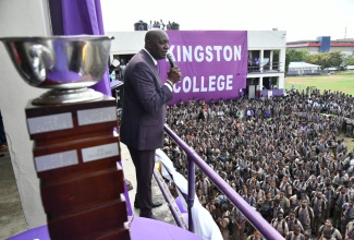 Principal, Kingston College (KC), Dave Myrie, addresses students at the institution located at North Street on Monday (March 25), as they celebrate the school’s victory in the just concluded ISSA/GraceKennedy Boys and Girls’ Athletics Championships.  KC secured their 35th title, the fourth in the last five years, with 335 points.

